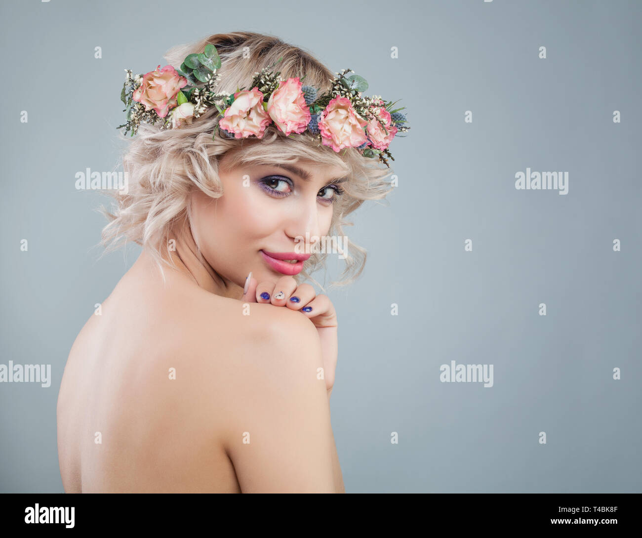 Nice Woman With Healthy Skin Makeup Flowers And Short Curly