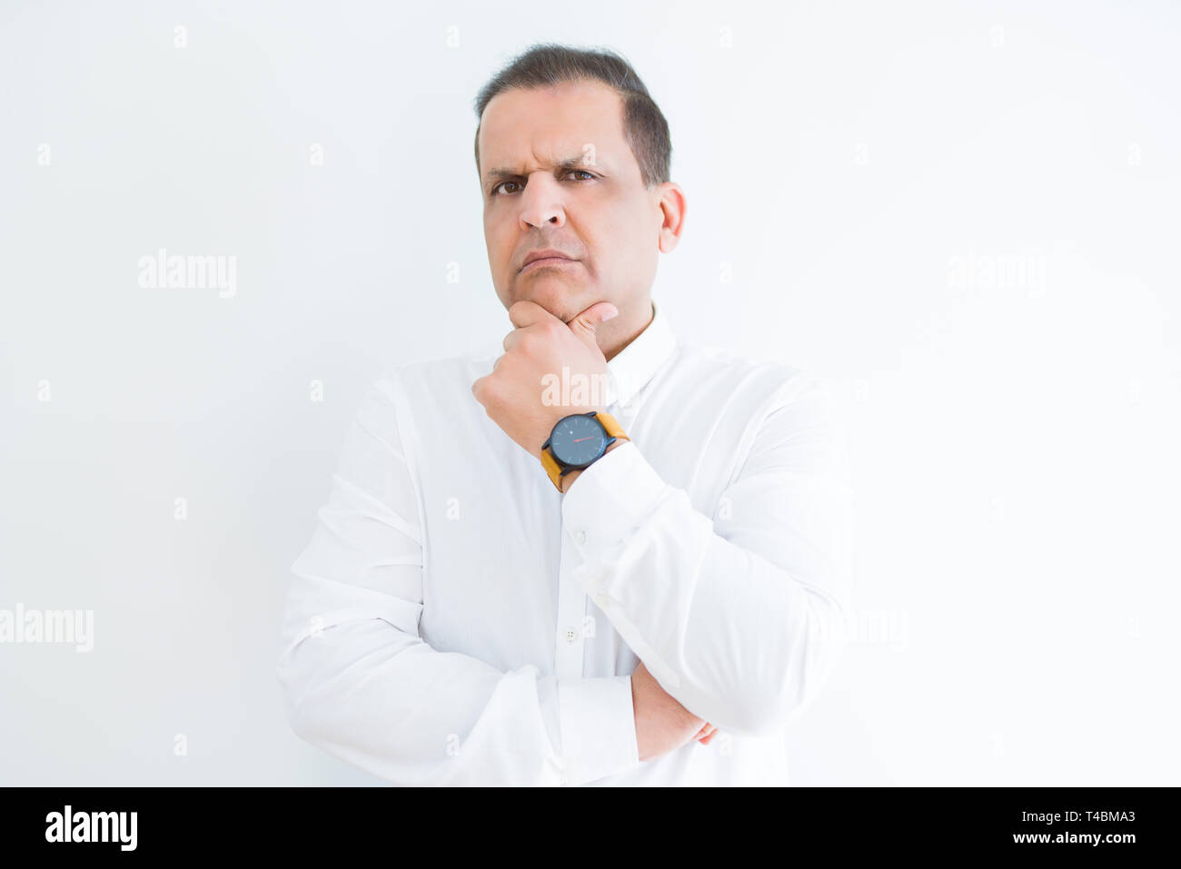 Middle age man thinking clueless about a question Stock Photo
