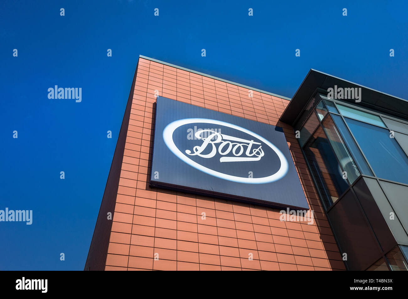 Sign for the store Boots on a modern building. Stock Photo