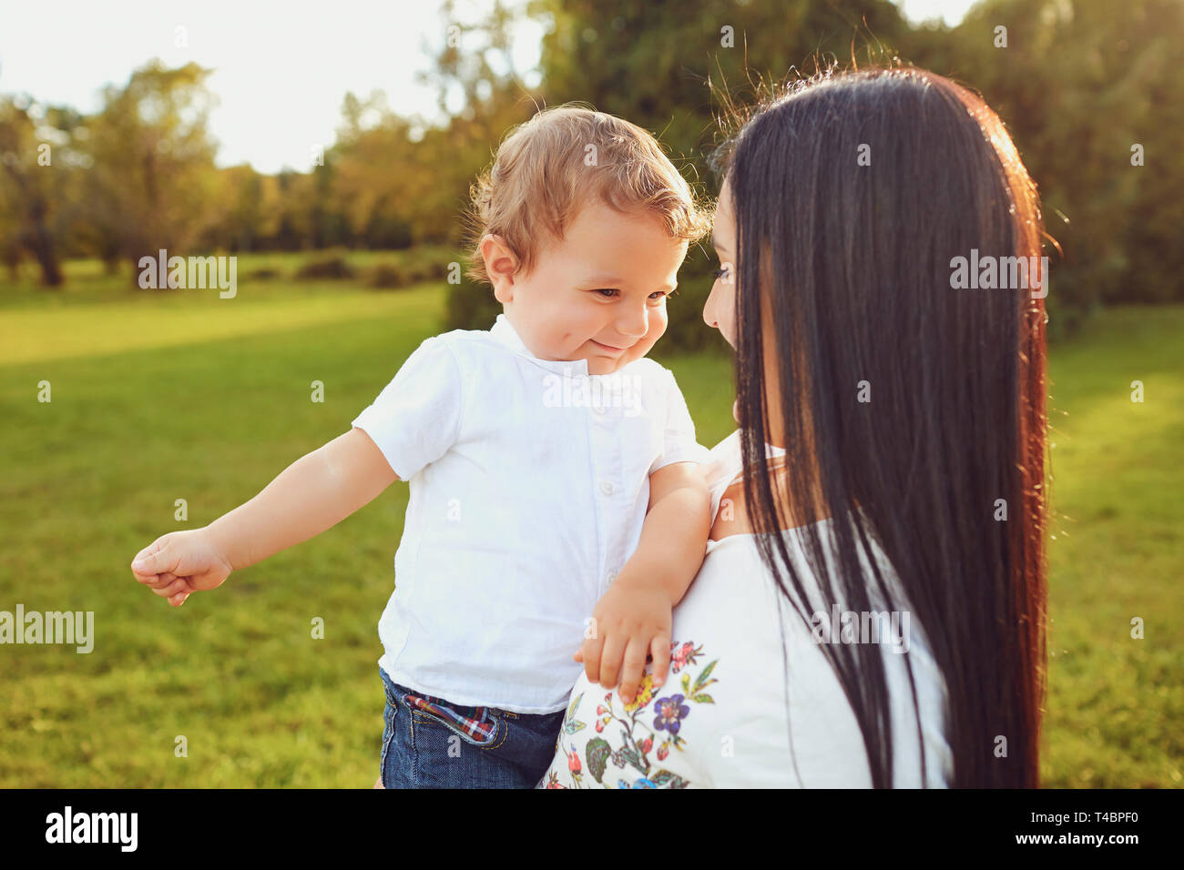 Beautiful mother son in arms hi-res stock photography and images - Alamy