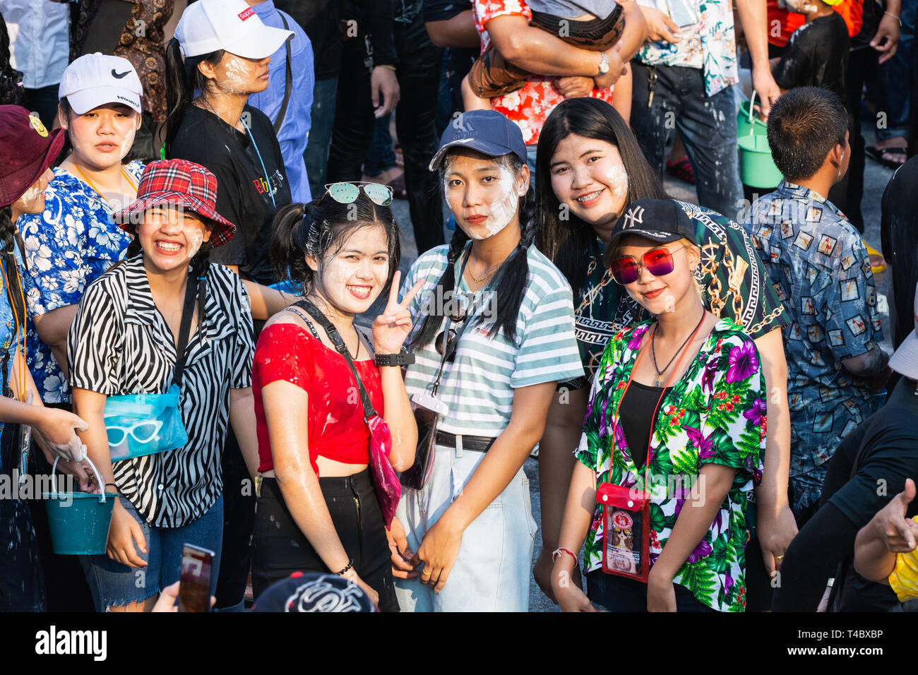 SUKHOTHAI, THAILAND - 15 APRIL 2019: Thai people celebrating New Year Songkran Water Festival on the street. Stock Photo