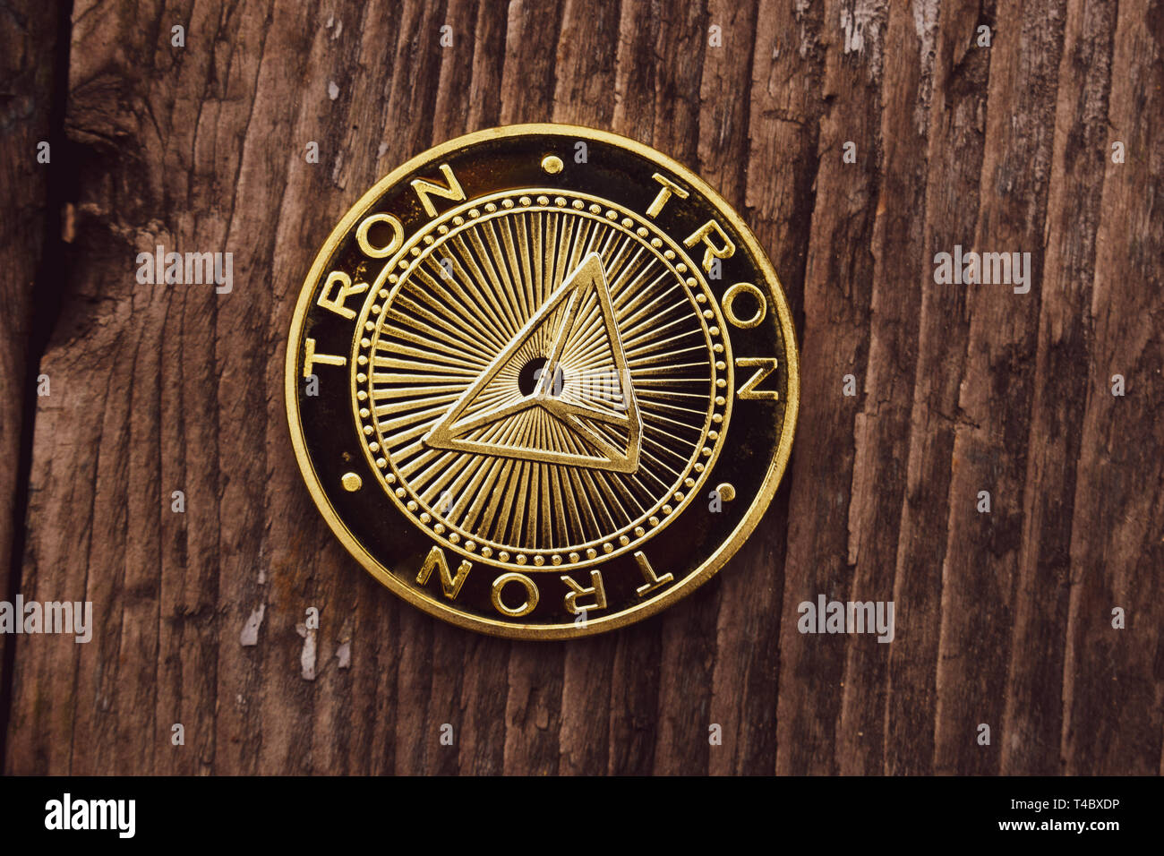Golden coin Tron TRX, digital money, new cryptocurrency. Tron is a  promising cryptocurrency Stock Photo - Alamy