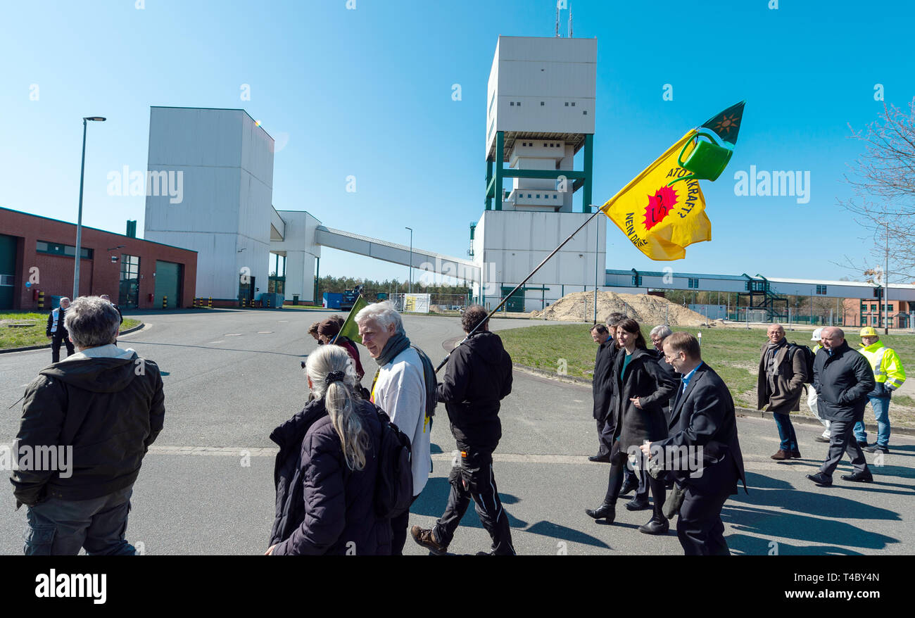Gorleben, Germany. 15th Apr, 2019. Visitors walk over the site of the former exploration mine. After decades of dispute over a repository for highly radioactive nuclear waste in Gorleben, the exploration area of the mine has been almost completely dismantled. During a symbolic final inspection of the salt dome it was now shown what the so-called open-keeping operation looks like. Credit: Philipp Schulze/dpa/Alamy Live News Stock Photo