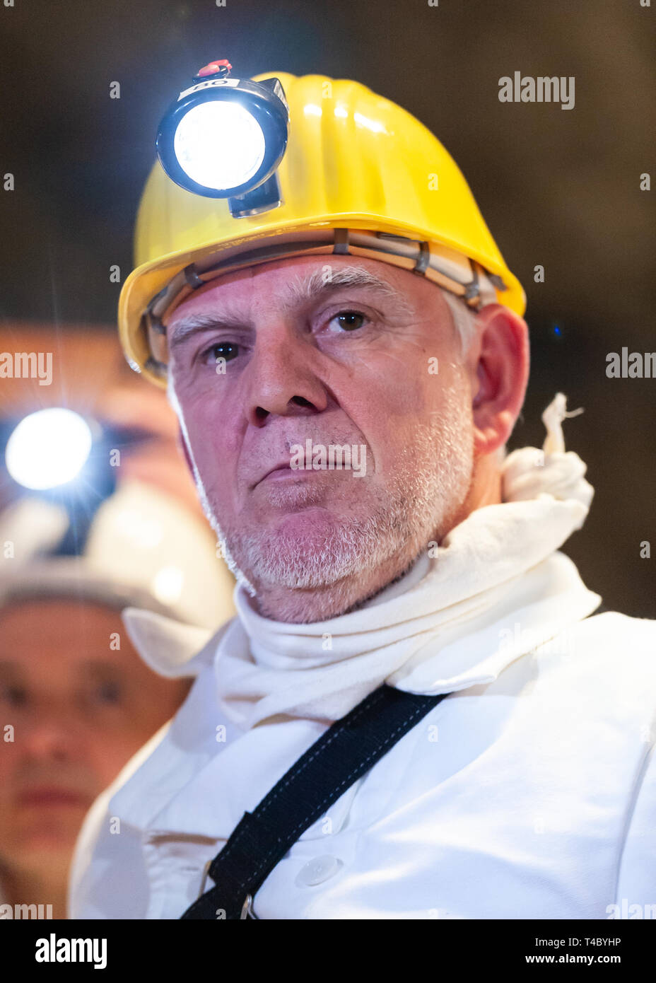 Gorleben, Germany. 15th Apr, 2019. Jochen Flasbarth, State Secretary at the Federal Environment Ministry, is standing underground in the former exploration mine. After decades of dispute over a repository for highly radioactive nuclear waste in Gorleben, the exploration area of the mine has been almost completely dismantled. During a symbolic final inspection of the salt dome it was now shown what the so-called open-keeping operation looks like. Credit: Philipp Schulze/dpa/Alamy Live News Stock Photo