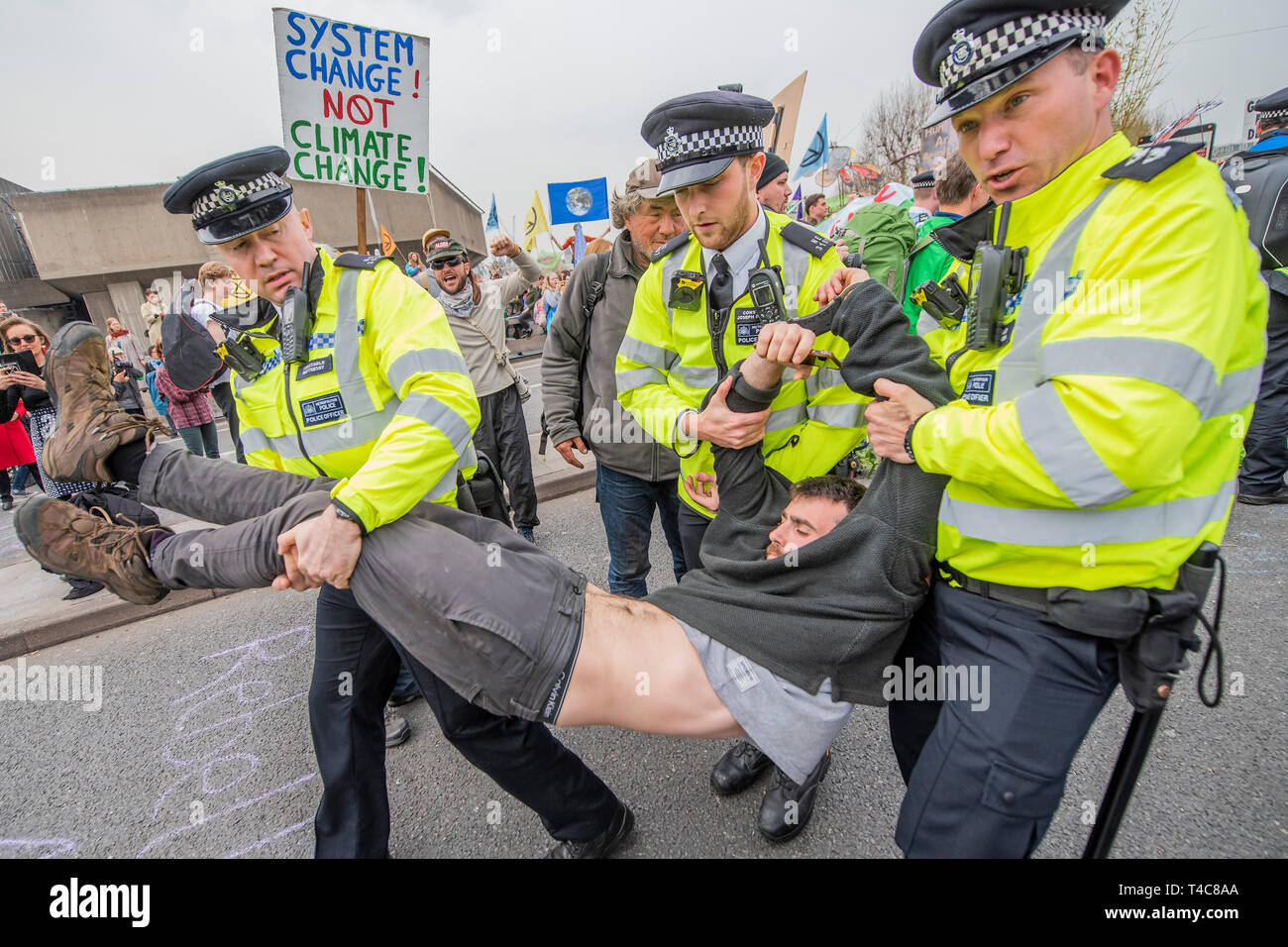 London, UK. 16th Apr, 2019. Police warn people blocking Waterloo Bridge under the public order act and then arrest them if they refuse to move to Marble Arch. It is mostly good humoured but some are dragged away to cheers from the remainder -  Day 2 - Protestors from Extinction Rebellion block several (Hyde Park, Oxford Cuircus, Warterloo Bridge and Parliament Square) junctions in London as part of their ongoing protest to demand action by the UK Government on the 'climate chrisis'. The action is part of an international co-ordinated protest. Credit: Guy Bell/Alamy Live News Stock Photo