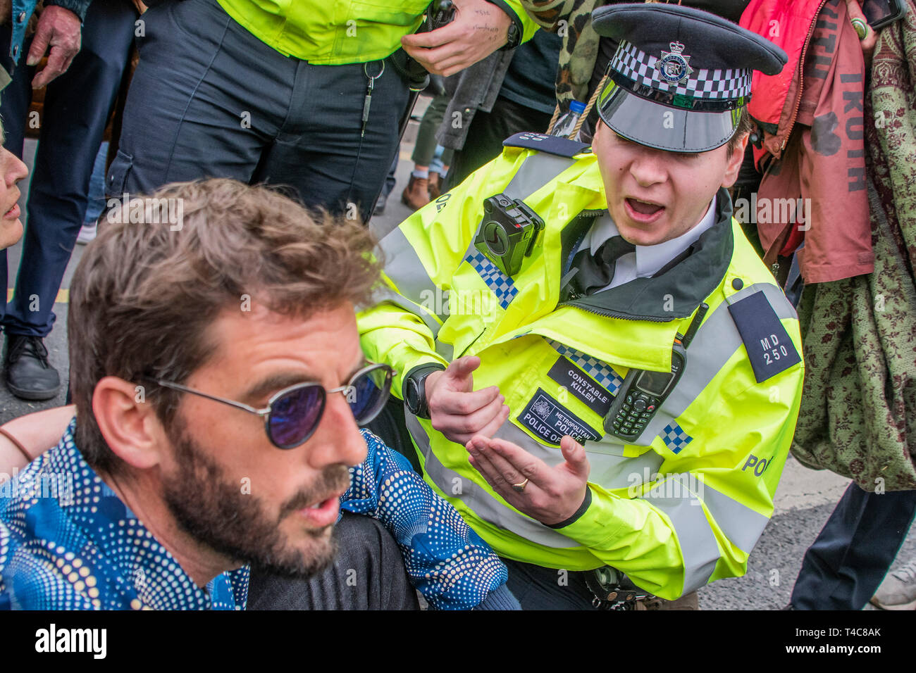 London, UK. 16th Apr, 2019. Police warn people blocking Waterloo Bridge under the public order act and then arrest them if they refuse to move to Marble Arch. It is mostly good humoured but some are dragged away to cheers from the remainder -  Day 2 - Protestors from Extinction Rebellion block several (Hyde Park, Oxford Cuircus, Warterloo Bridge and Parliament Square) junctions in London as part of their ongoing protest to demand action by the UK Government on the 'climate chrisis'. The action is part of an international co-ordinated protest. Credit: Guy Bell/Alamy Live News Stock Photo