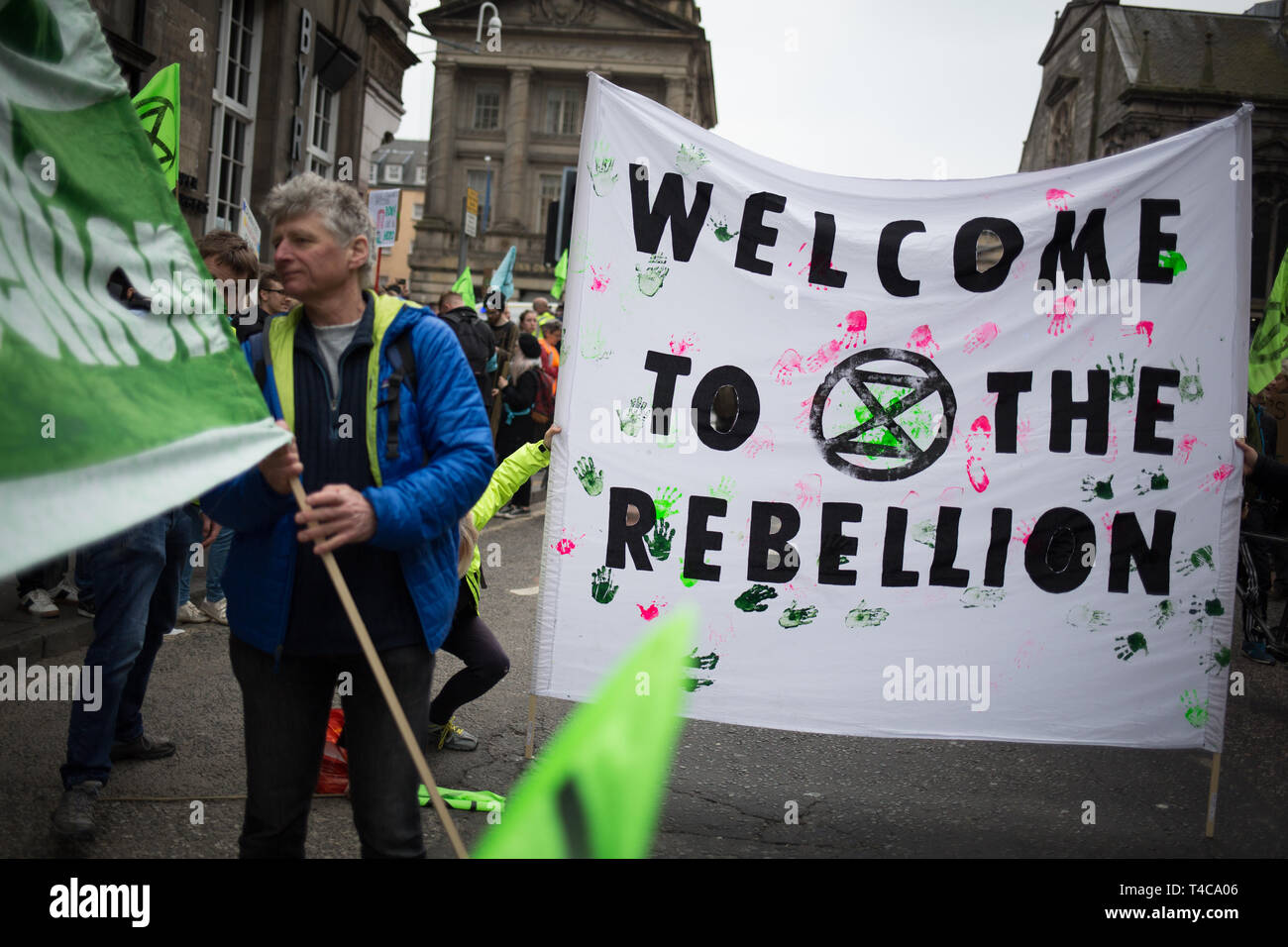 Edinburgh, Scotland, 16th April 2019. Extinction Rebellion (Scotland) climate protestors shut North Bridge to traffic during an 'International Day of Rebellion', asking for the government to declare a climate emergency, in Edinburgh, Scotland, on 16 April 2019. Credit: Jeremy Sutton-Hibbert/Alamy Live News Stock Photo