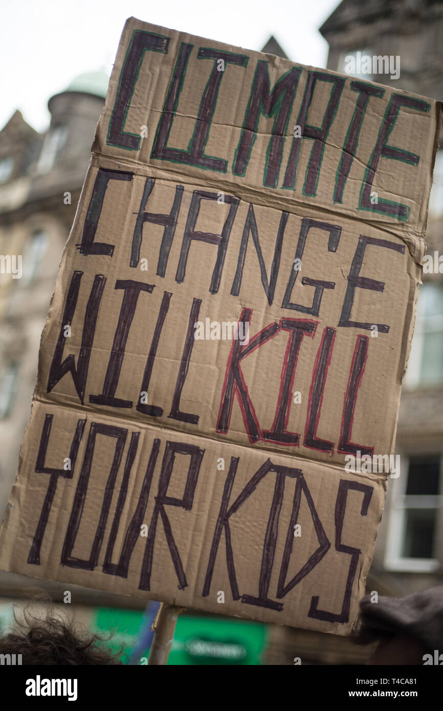 Edinburgh, Scotland, 16th April 2019. Extinction Rebellion (Scotland) climate protestors shut North Bridge to traffic during an 'International Day of Rebellion', asking for the government to declare a climate emergency, in Edinburgh, Scotland, on 16 April 2019. Credit: Jeremy Sutton-Hibbert/Alamy Live News Stock Photo