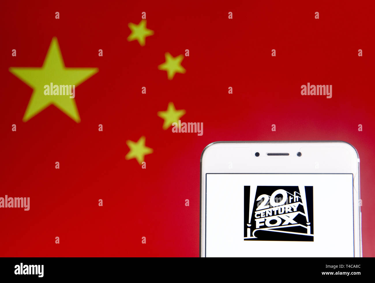Hong Kong. 6th Apr, 2019. In this photo illustration a American film studio Twentieth 20th Century Fox Film Corporation logo is seen on an Android mobile device with People's Republic of China flag in the background. Credit: Budrul Chukrut/SOPA Images/ZUMA Wire/Alamy Live News Stock Photo