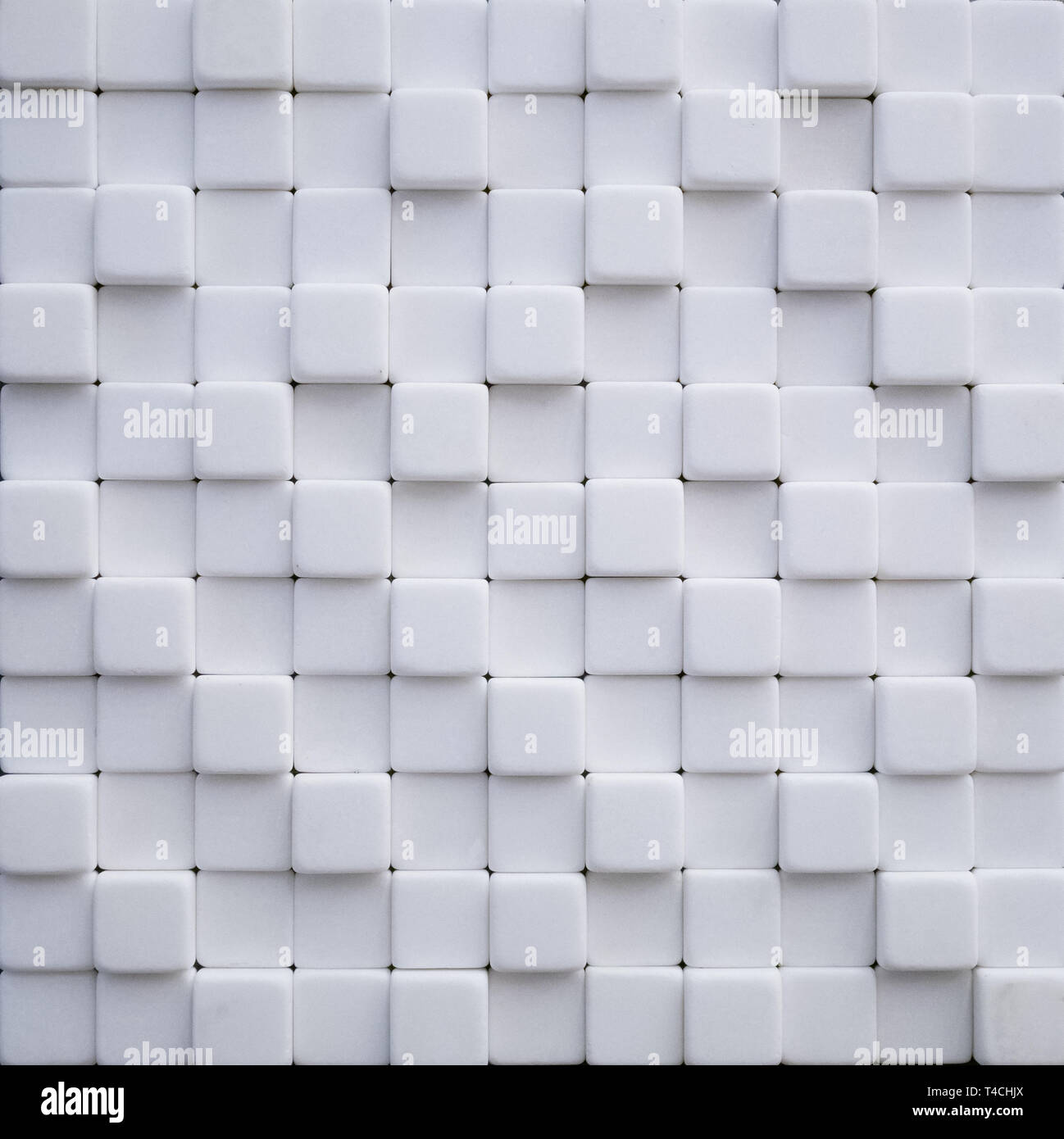 abstract wallpaper or background made of white marble stone cubes Stock