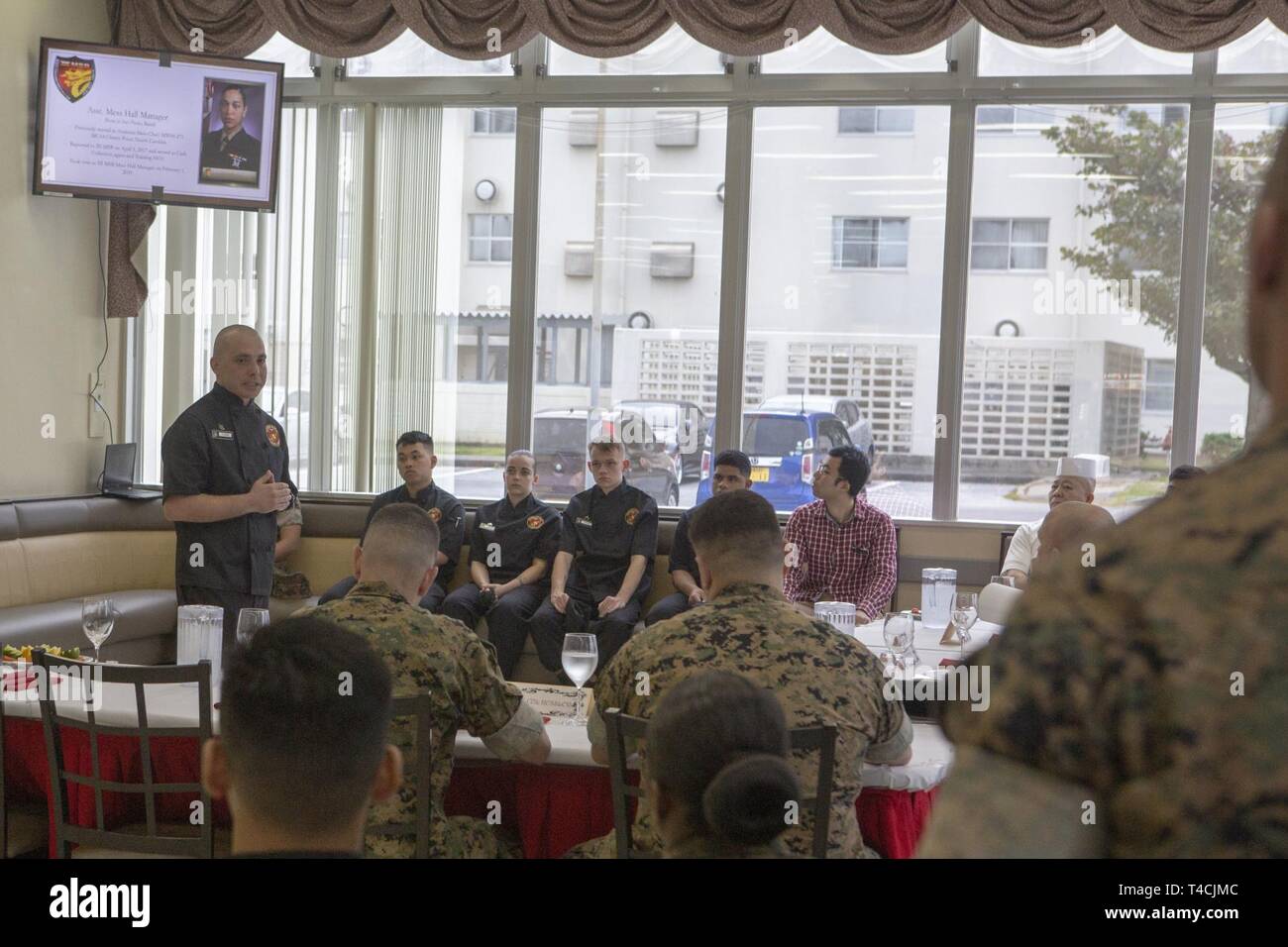 U.S. Marine Corps Gunnery Sgt. Adrian Flaisz briefs Marines, staff and ...