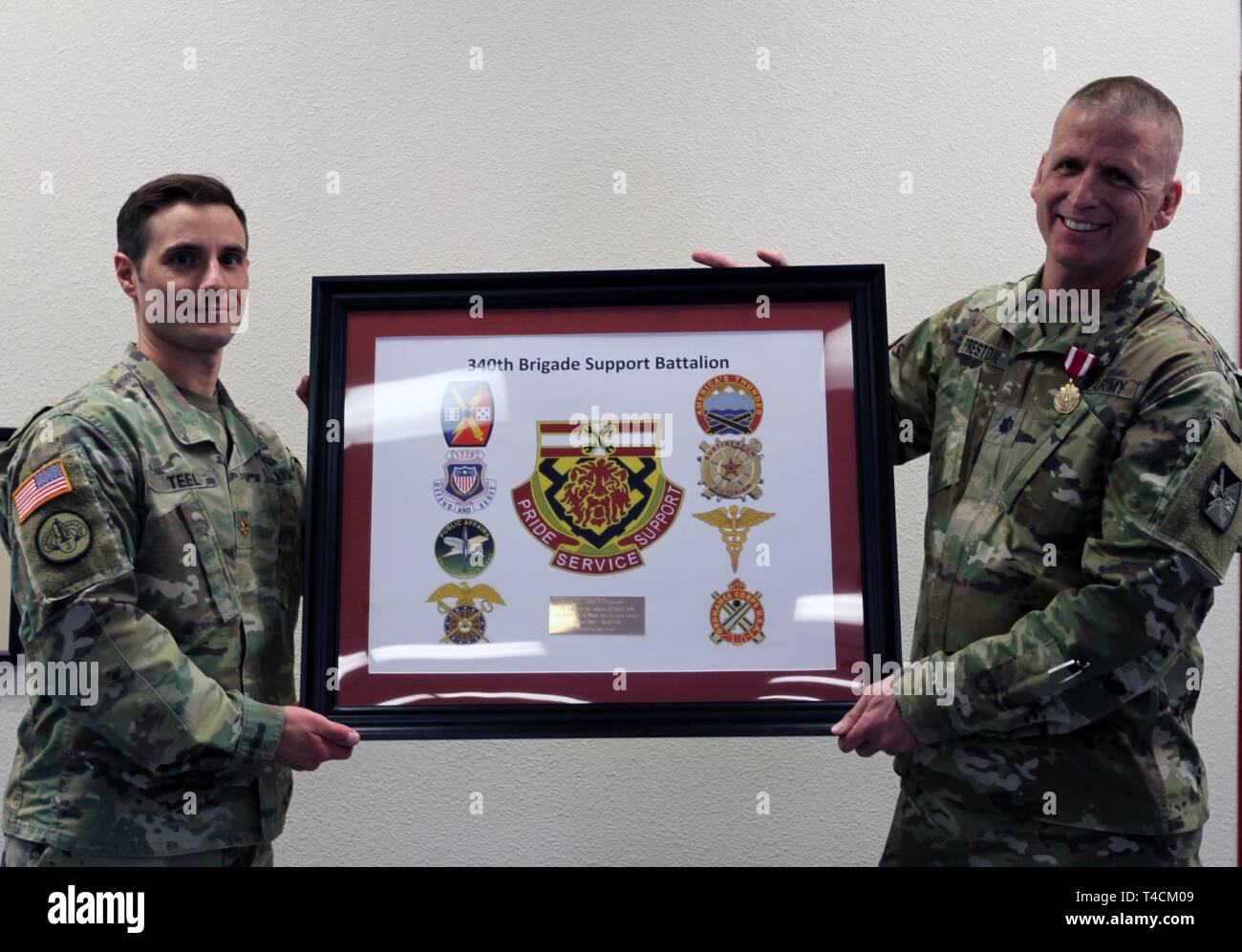 U.S. Army Maj. Michael C. Teel, left, operations officer of the 340th ...