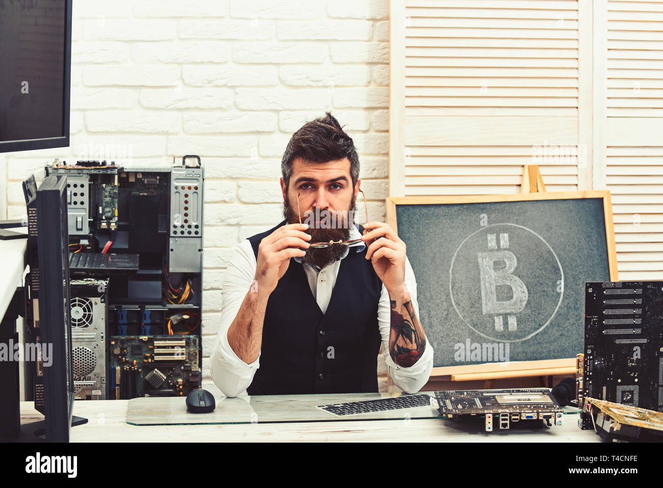 Cryptographer. Bearded man bitcoiner. Bitcoin miner man in server room.  Bearded businessman with computer circuits for bitcoin mining. Crypto  currency Stock Photo - Alamy
