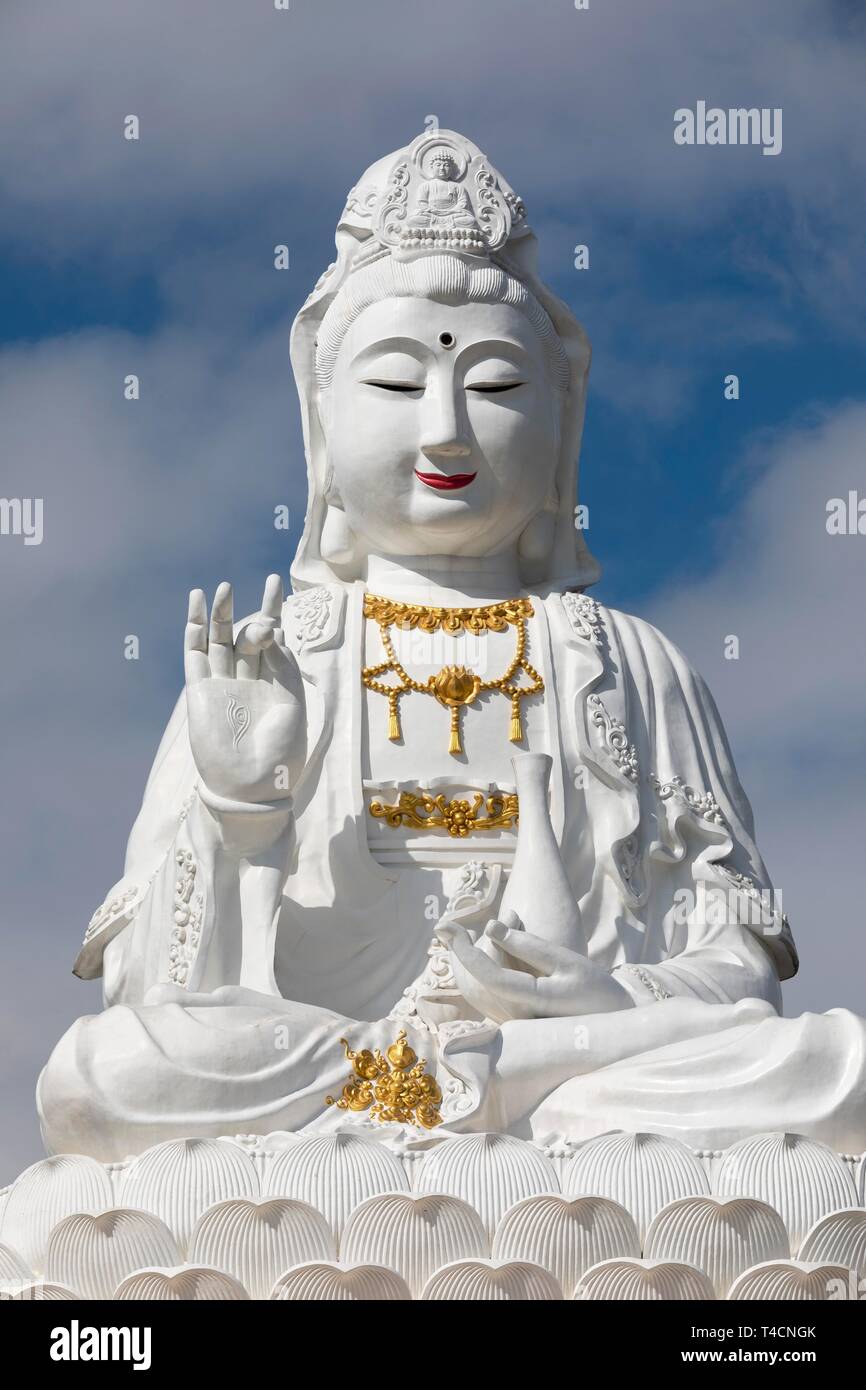 Guan Yin statue at Wat Huay Pla Kang temple, sitting Buddha on lotus