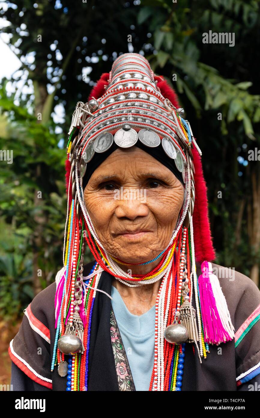 Akha woman with silver jewellery and headdress, portrait, hill tribes, mountain people, province Chiang Rai, northern Thailand, Thailand Stock Photo