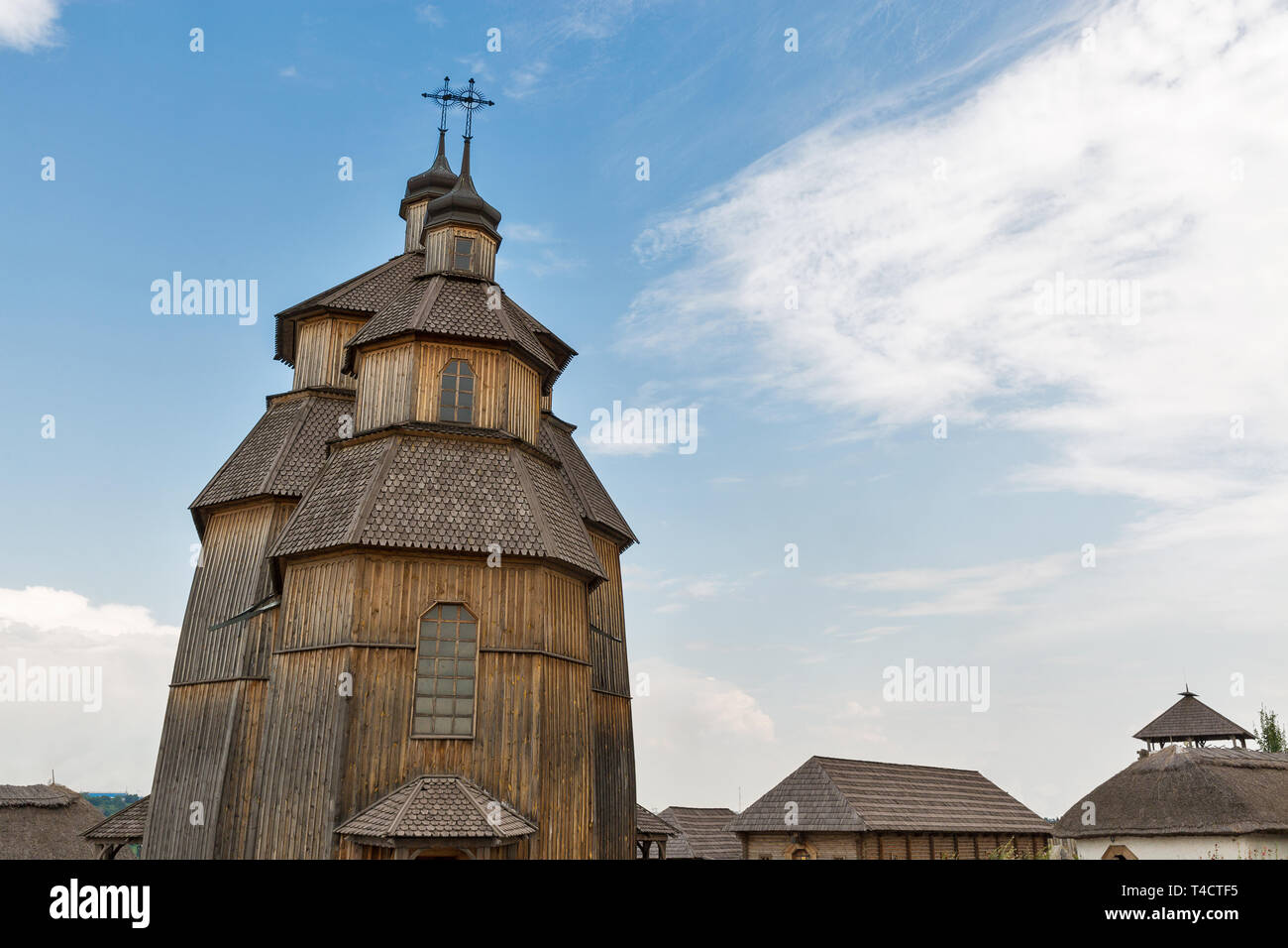 Medieval wooden church, temple of Cossacks. Buildings on Zaporozhskaya Sich on island of Khortytsia in Ukraine. Stock Photo