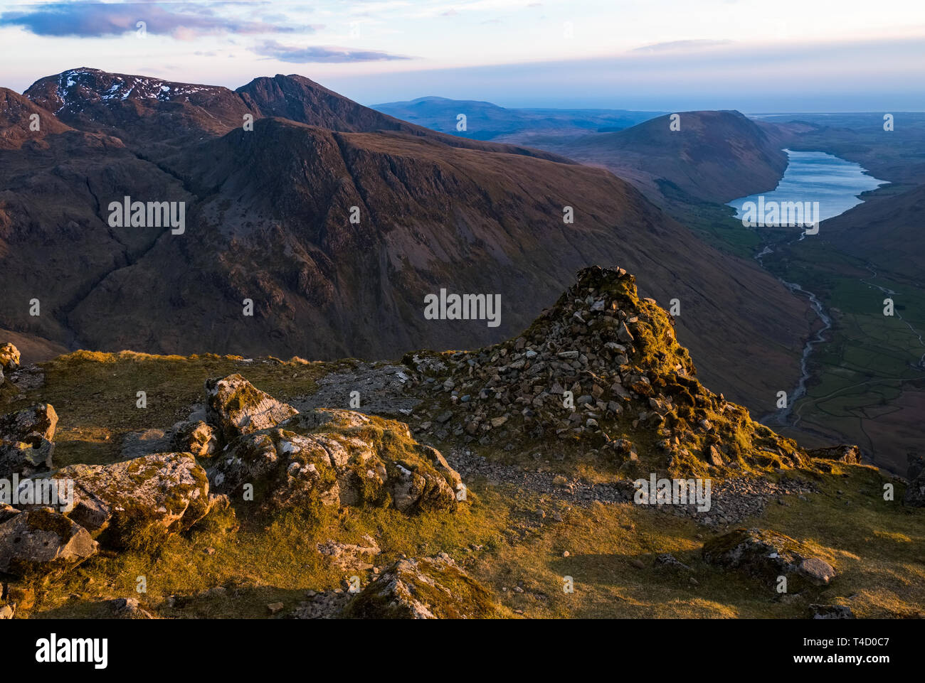 Scafell Pike, Sca Fell, Lingmell, Illgill Head & Wast Water from the Westmorland Cairn near the summit of Great Gable in the English Lake District. Stock Photo