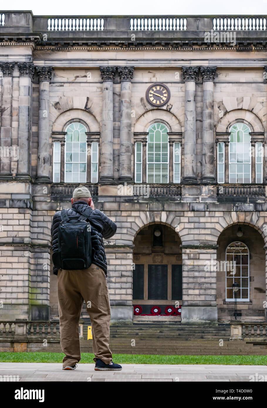 Man taking photograph of Old College quad, Edinburgh, Scotland, UK Stock Photo