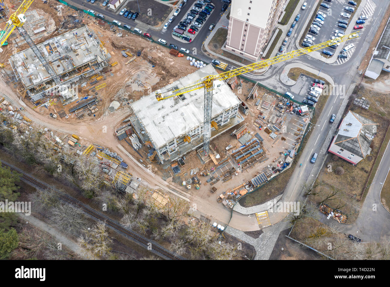 aerial top view of city construction area with unfinished buildings ...