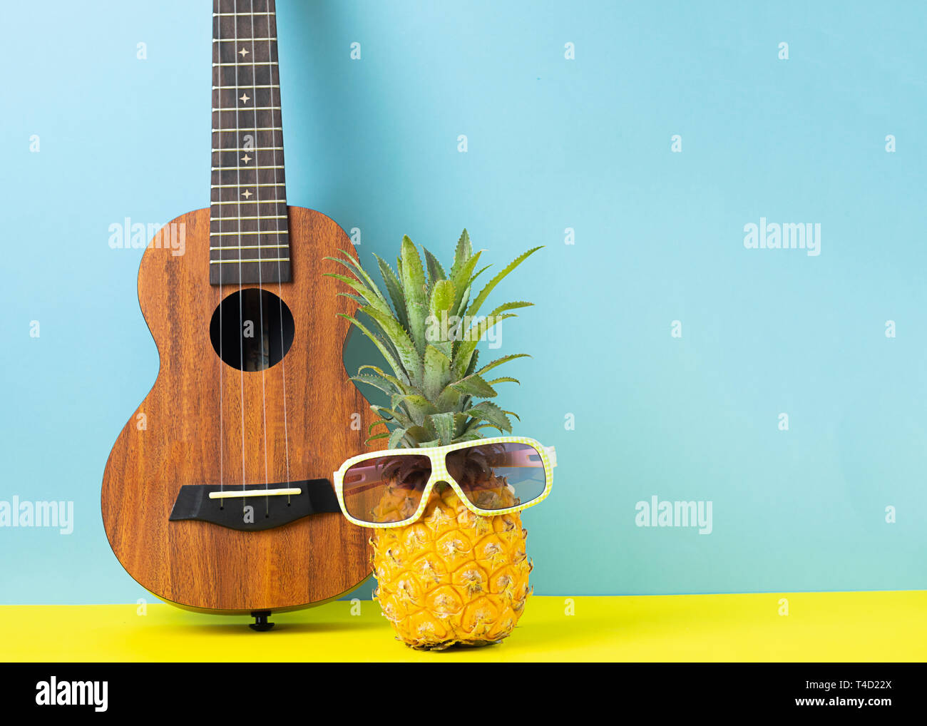 Funny Pineapple With Glasses Guitar On A Bright Blue Background Recreation And Summer Party Concept Horizontal Frame Stock Photo Alamy
