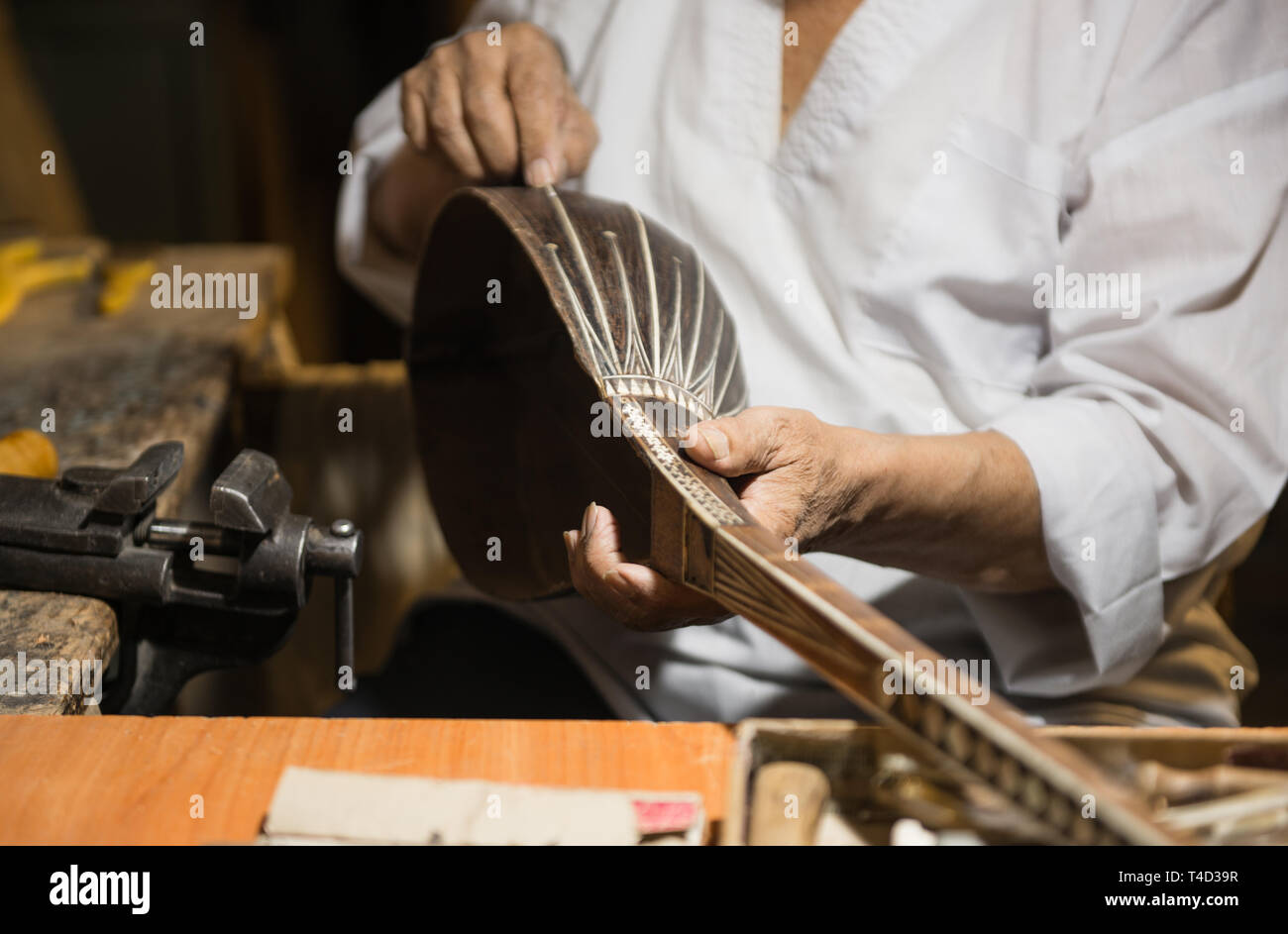 Maker of stringed instruments hires stock photography and images Alamy