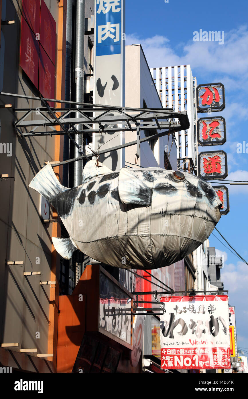 Giant puffer fish advertising sign in Dotonbori, Osaka, Japan Stock Photo