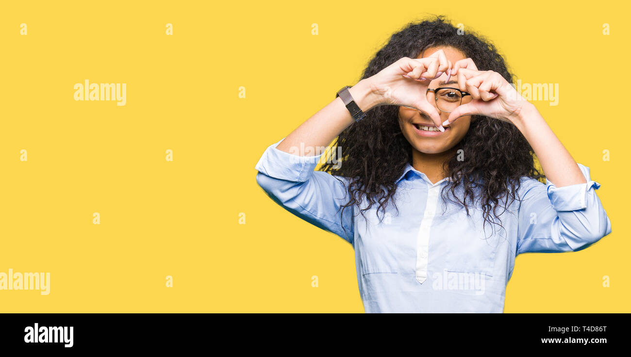 Young Beautiful Business Girl With Curly Hair Wearing Glasses