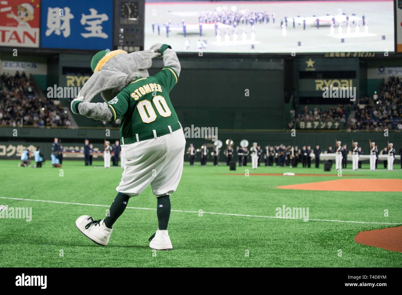 Children gather to have their photo taken with BB, the mascot of the  Hokkaido Nippon Ham Fighters professional baseball team Stock Photo - Alamy