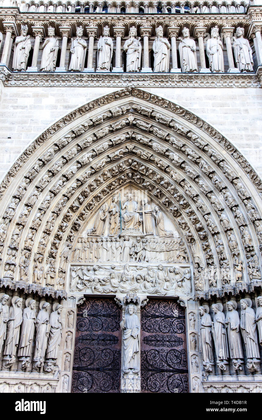 Close-up of The Portal of Judgement carved lintel and entrance to Notre Dame Cathedral, Paris, France Stock Photo