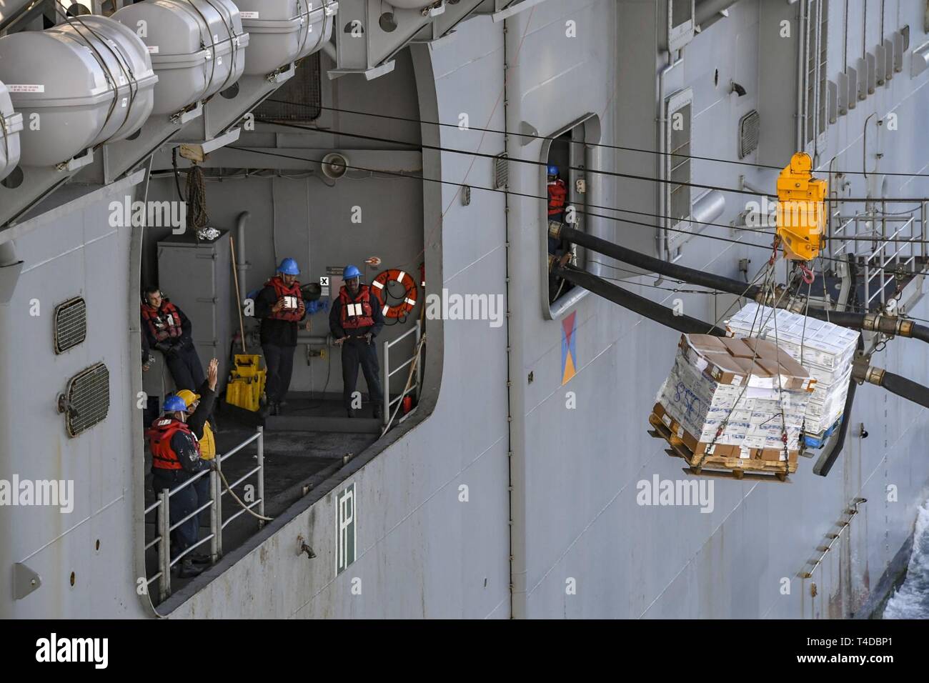 OCEAN (March 23, 2019) Amphibious assault ship USS Boxer (LHD 4) takes ...