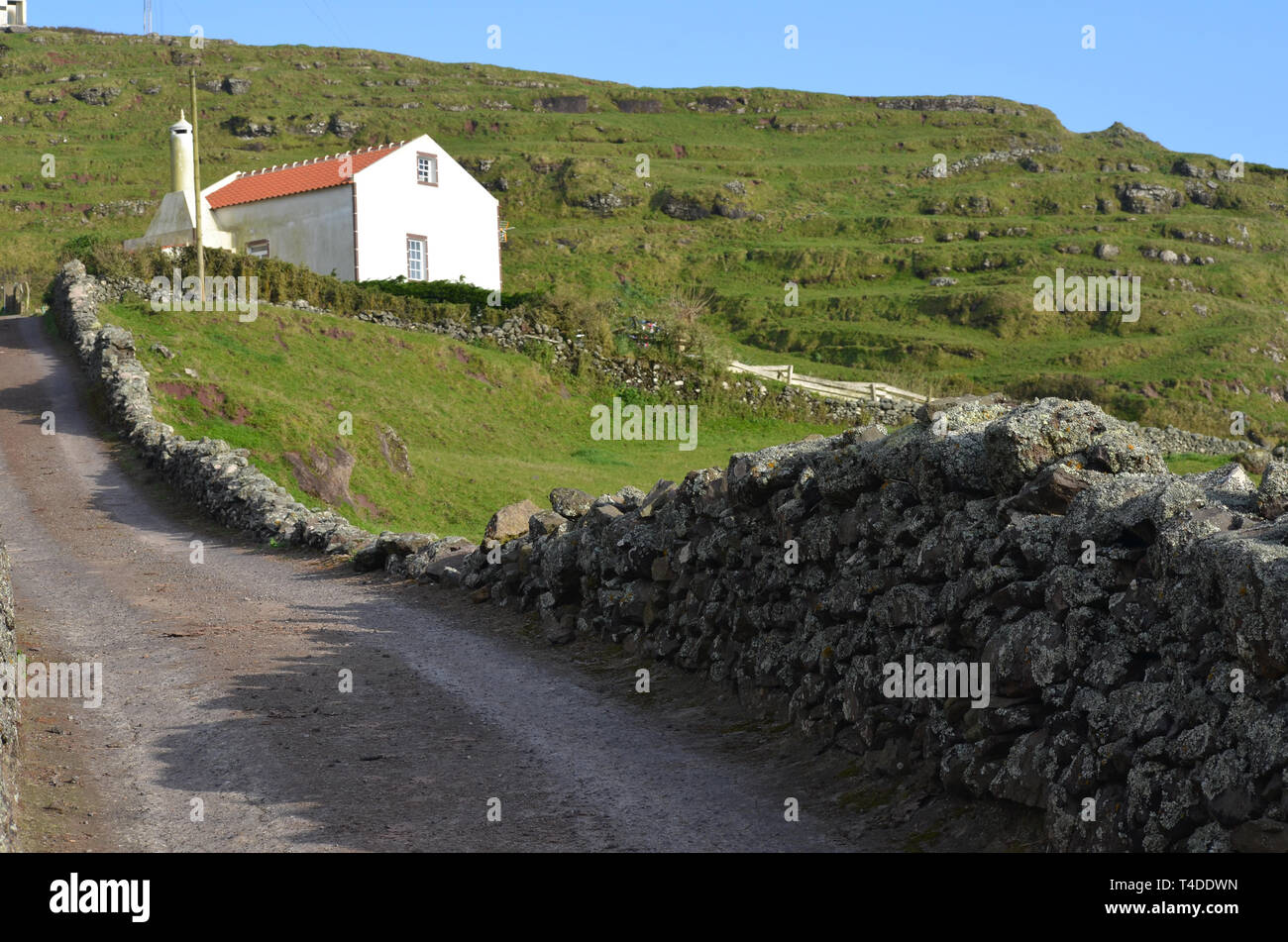 Traditional houses in Malbusca, Santa Maria island, Azores. This parish is now threatened by a project to install a satellite-launching base. Stock Photo