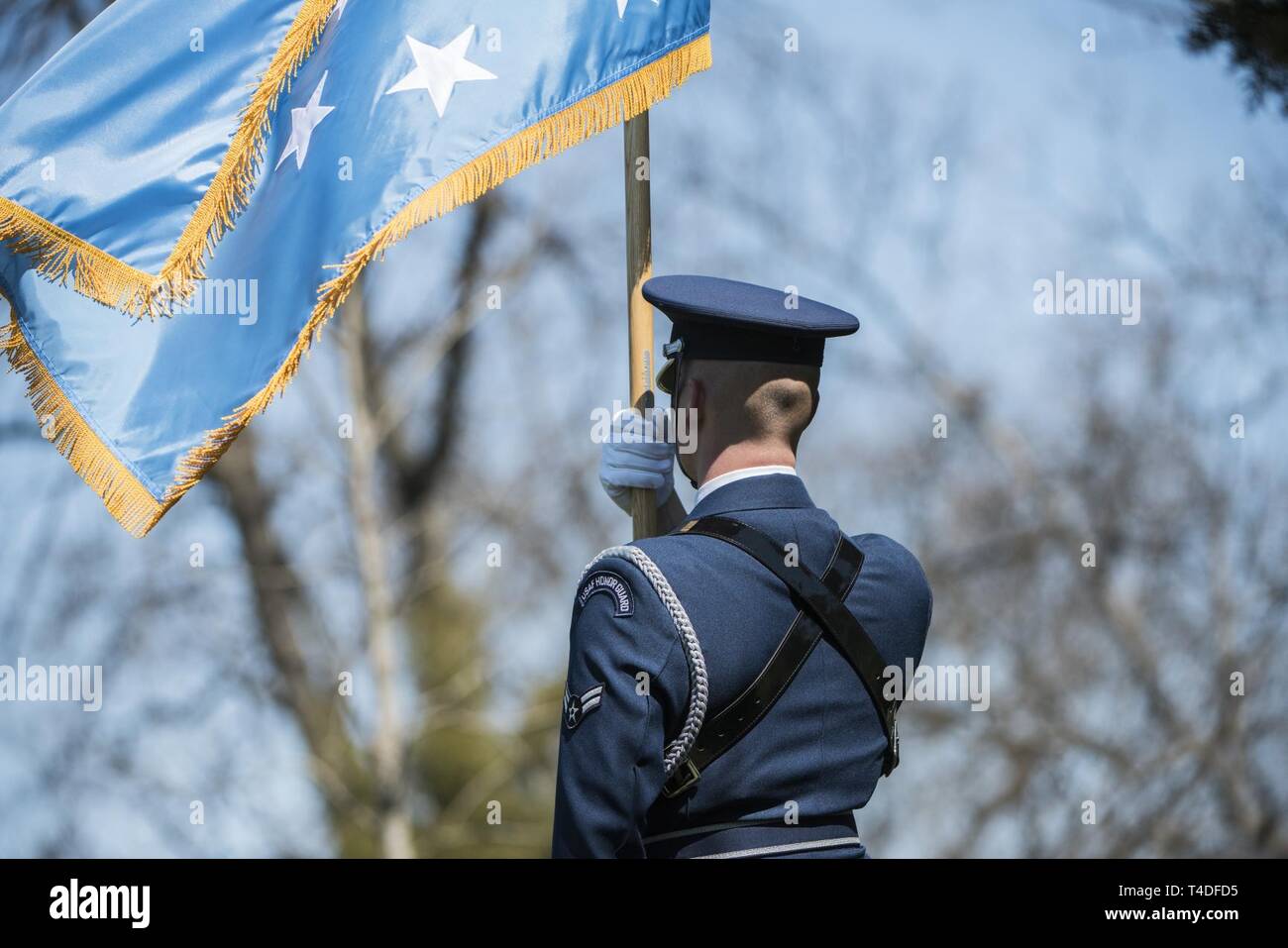 A Personal Color Bearer of the U.S. Air Force Honor Guard carries the