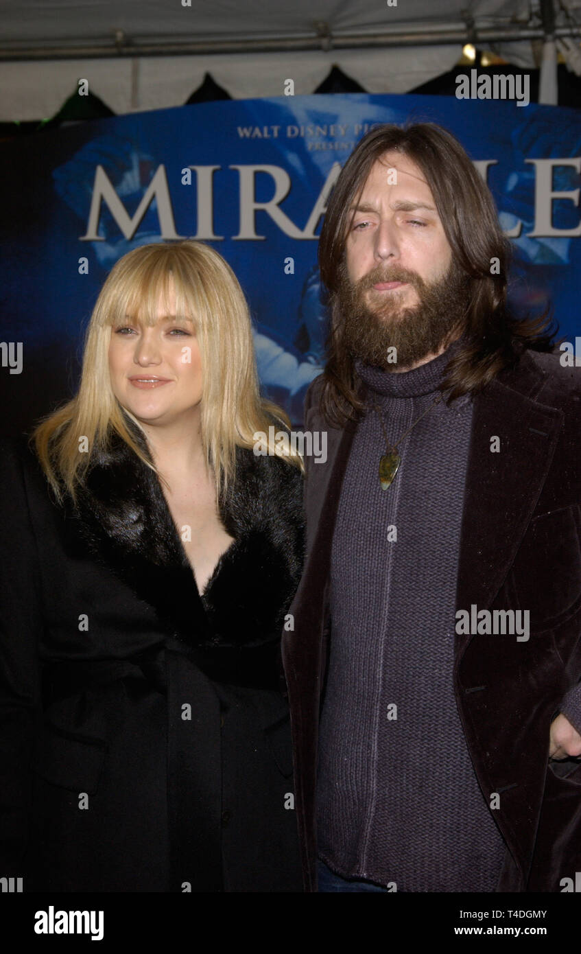 LOS ANGELES, CA. February 02, 2004: Actress KATE HUDSON & husband CHRIS ROBINSON at the world premiere, in Hollywood, of Miracle. Stock Photo