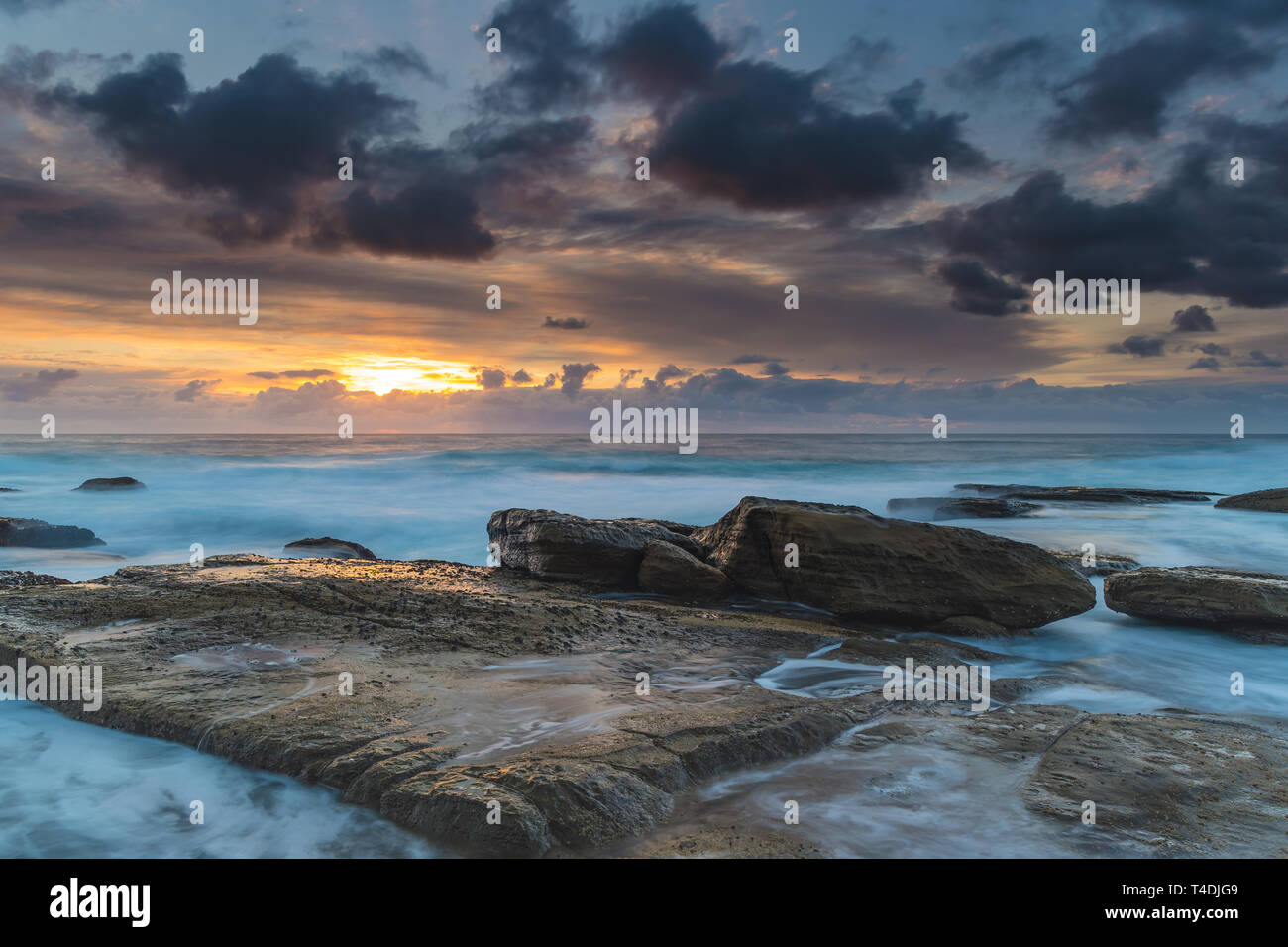 Capturing the sunrise from The Skillion at Terrigal on the Central