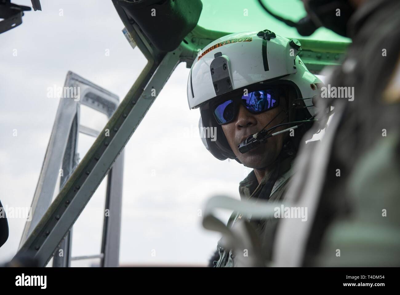 Philippine Air Force Maj. Philippides Jimenez speaks with his copilot