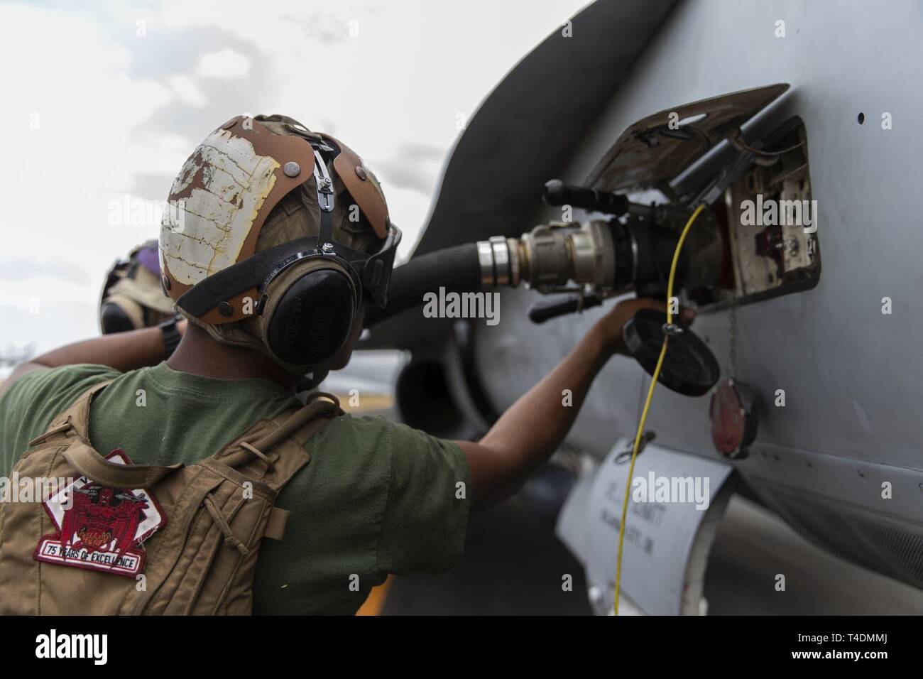 U.S. Marine Corps Lance Cpl. Daniel Vasquez refuels an F/A-18C Hornet with Marine Fighter Attack Squadron (VMFA) 232 at Clark Air Base, Philippines, April 3, 2019 during Exercise Balikatan. Balikatan is an annual exercise between the U.S. and the Philippines and comes from a Tagalog phrase meaning 'shoulder-to-shoulder,' representing the partnership between the two countries. The exercise promotes regional security and humanitarian efforts for U.S. allies and partners. Vasquez, a Fontana, California native, is an aviation mechanic with VMFA-232. Stock Photo