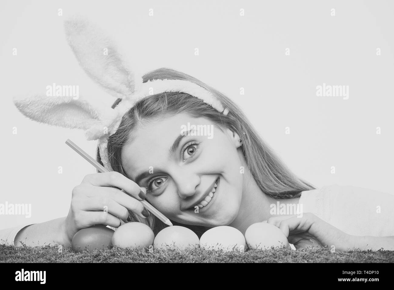 Smiling girl wear bunny ears Stock Photo - Alamy