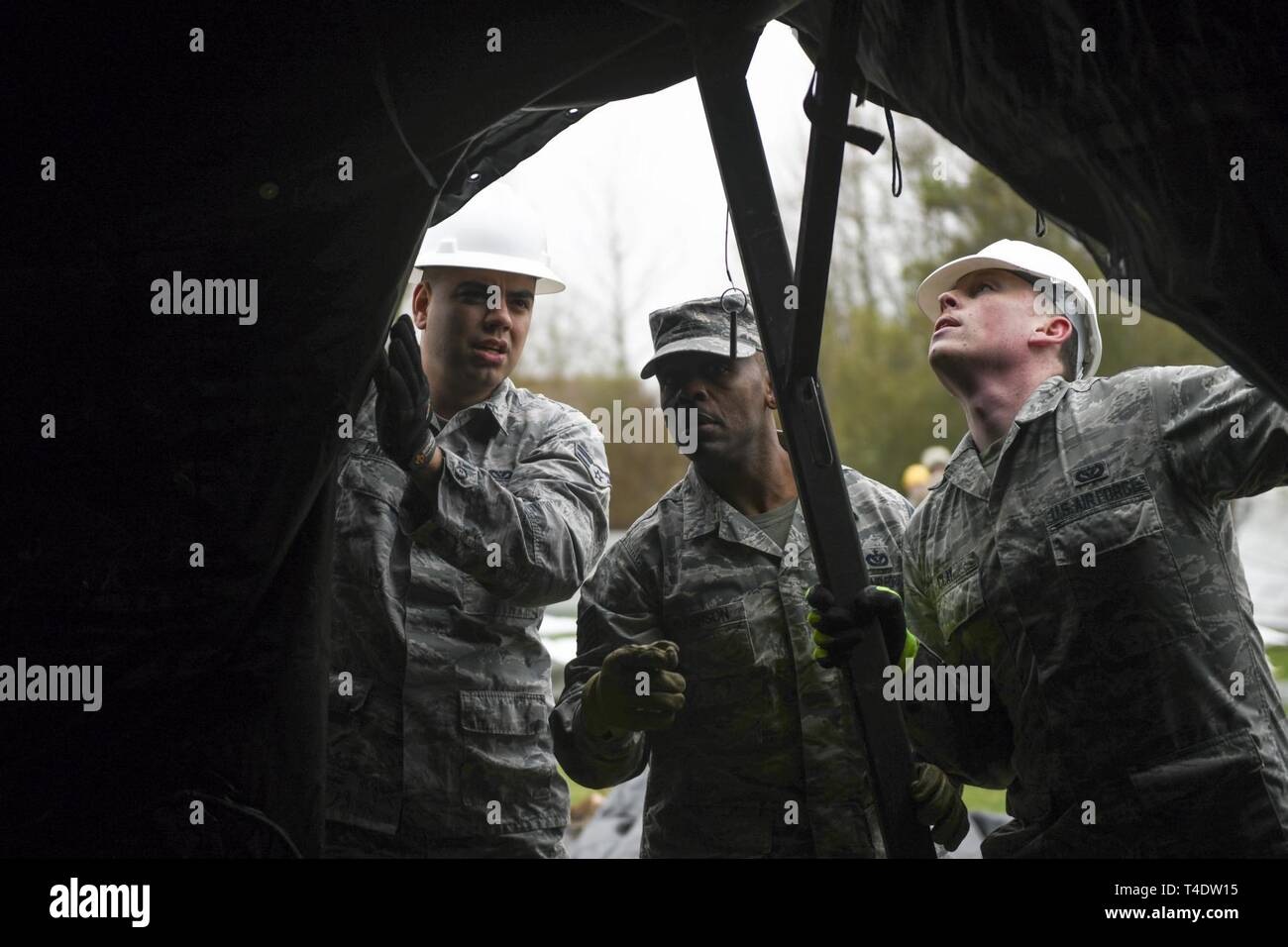 48th Civil Engineer Squadron members examine newly assembled Tent