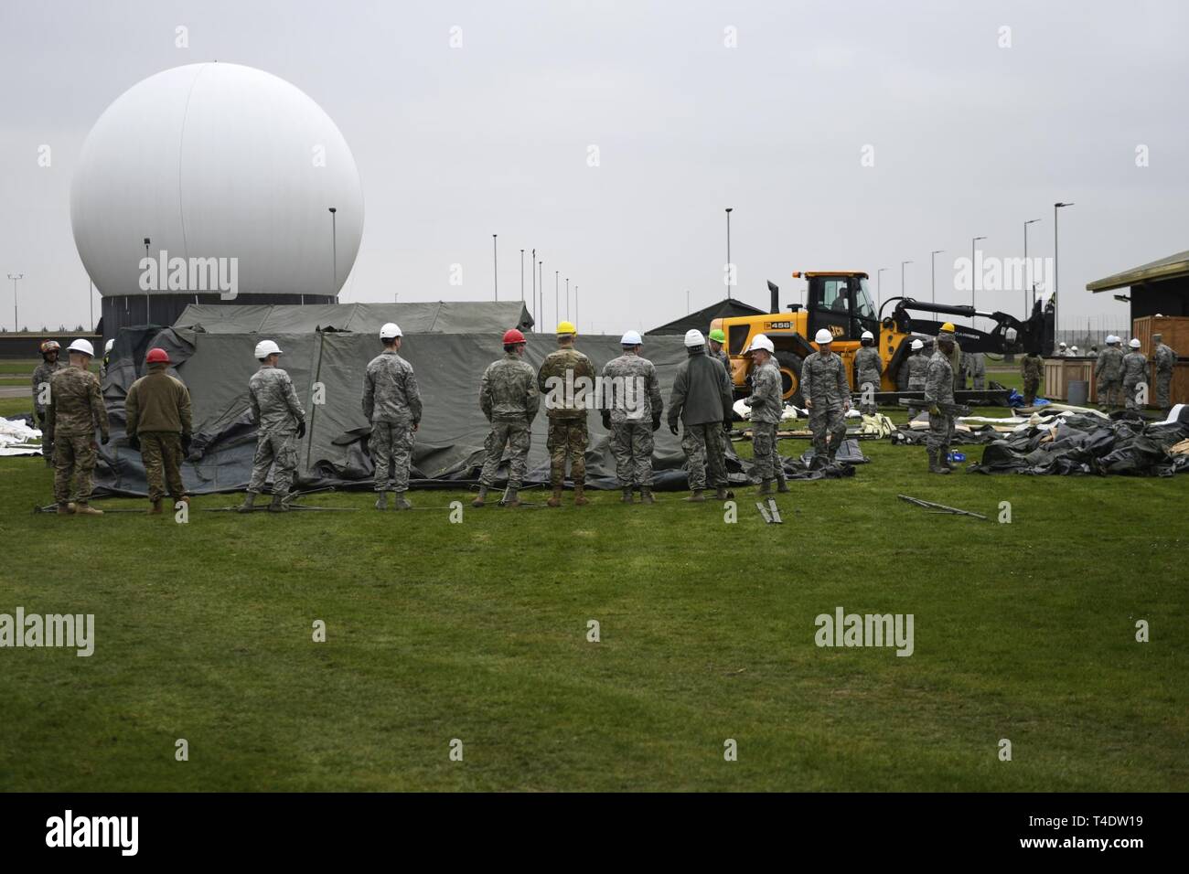 48th Civil Engineer Squadron members prepare to lift a Tent Extendable