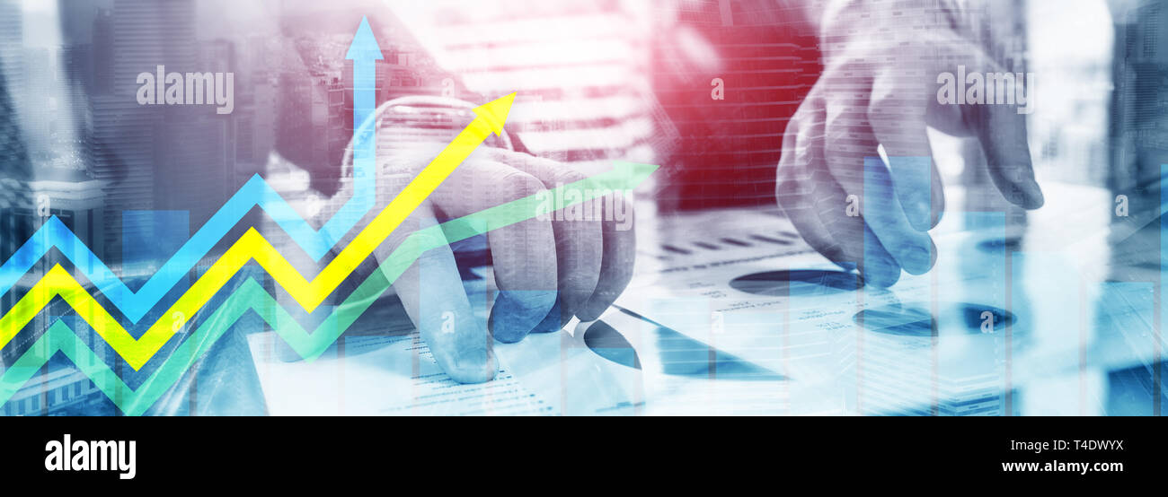 Financial growth arrows graph. Investment and trading concept. Stock Photo