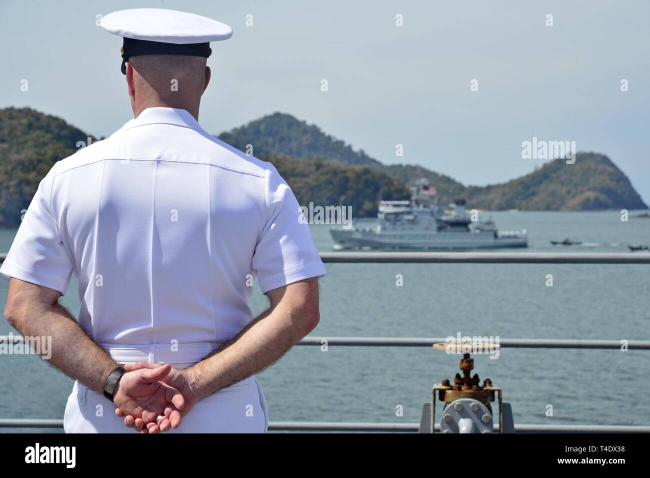 LANGKAWI, Malaysia (March 27, 2019) - U.S. 7th Fleet Flagship USS Blue Ridge (LCC 19) Command Master Chief James W. Grant, from Colorado Springs, Colo., stands at parade rest during the Langkawi International Maritime Aerospace Exhibition Fleet Review.  Blue Ridge is the oldest operational ship in the Navy, and as 7th Fleet command ship, is responsible for fostering relationships within the Indo-Pacific Region. Stock Photo