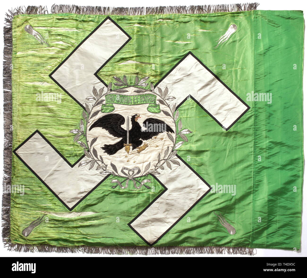 A battalion flag for the 'General Göring' Regiment. Light green silk with silver fringe on three sides. A white silk swastika set in black on both sides, with a laurel wreath around its centre with a rising eagle, embroidered in black and brown, clutching a sword and three lightning bolts in its talons. A light green scroll with 'Pro Gloria et Patria' above it, and a silver-embroidered flaming grenade in each corner. On both sides partially worn. Size 140 x 110 cm. Colour-fresh. Hermann Göring presented in September 1933 eight flags of this type , Additional-Rights-Clearance-Info-Not-Available Stock Photo