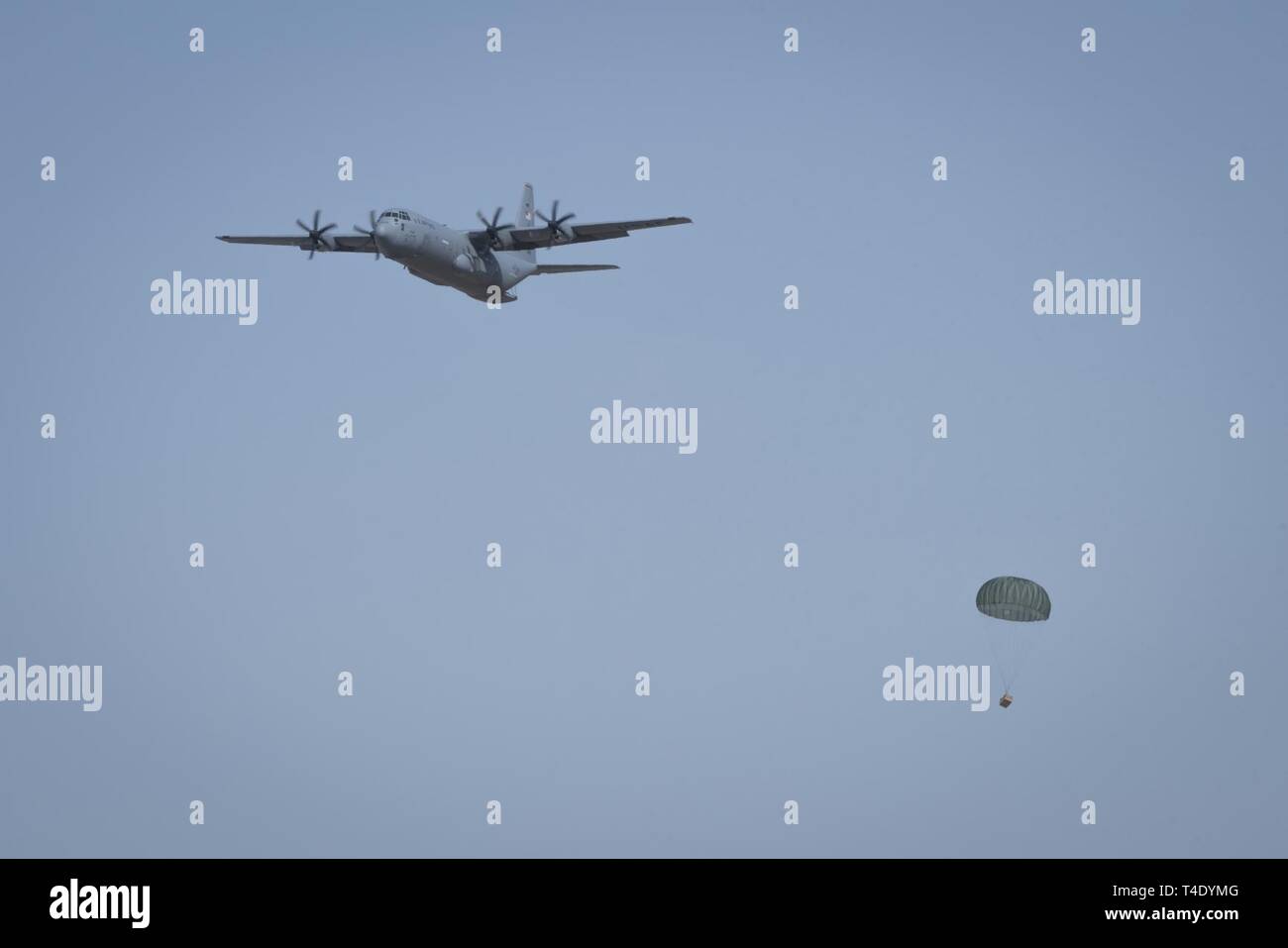 A 36th Airlift Squadron C-130J Super Hercules performs an airdrop ...