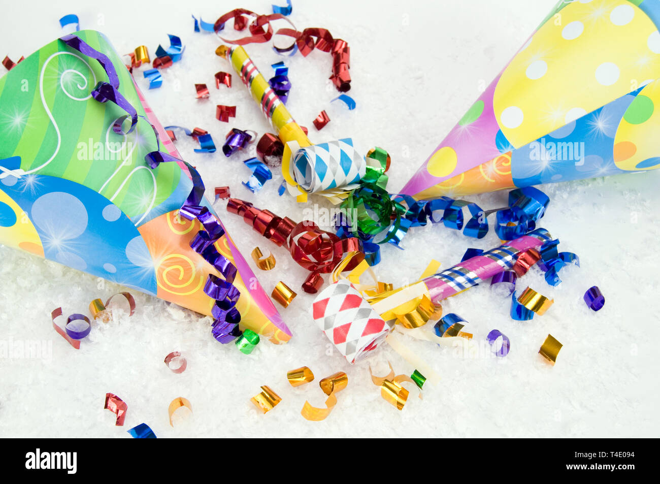 Celebration, Party New Year’s Eve Hats and Horns on Snow Stock Photo