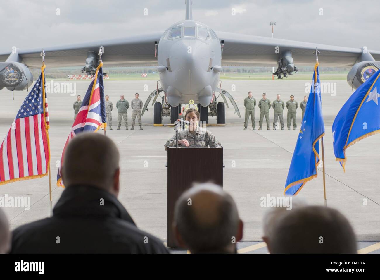 U.S. Air Force 1st Lt. Sarah Johnson, 501st Combat Support Wing public affairs officer, speaks during a press conference at RAF Fairford, March 19, 2019, regarding the Bomber Task Force Europe deployment. The contingent of B-52 aircraft, Airmen and support equipment are currently deployed from the 2nd Bomb Wing, Barksdale Air Force Base, La., to support the BTF. The deployment of strategic bombers to the U.K. helps exercise RAF Fairford as U.S. Air Forces in Europe - Air Forces Africa’s forward-operating location for bombers. The deployment includes joint and allied training to enhance interop Stock Photo