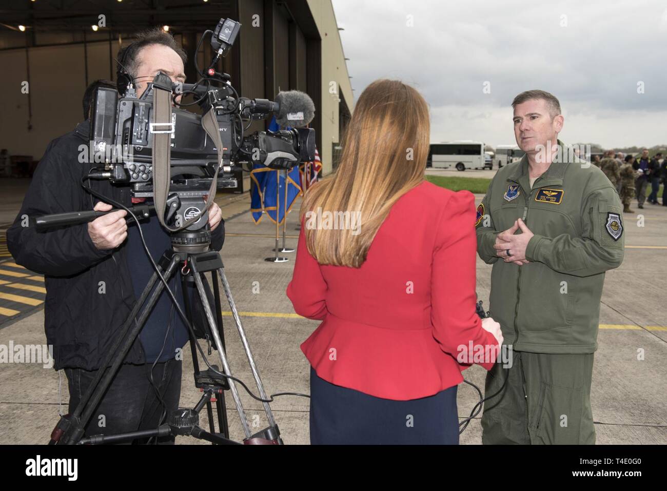 U.S. Air Force Lt. Col. Mike Esposito, Bomber Task Force in Europe commander, speaks with reporter during a press conference at RAF Fairford, March 19, 2019, regarding a Bomber Task Force Europe deployment. The contingent of B-52 aircraft, Airmen and support equipment are currently deployed from the 2nd Bomb Wing, Barksdale Air Force Base, La., to support the BTF. The deployment of strategic bombers to the U.K. helps exercise RAF Fairford as U.S. Air Forces in Europe - Air Forces Africa’s forward-operating location for bombers. The deployment includes joint and allied training to enhance inter Stock Photo