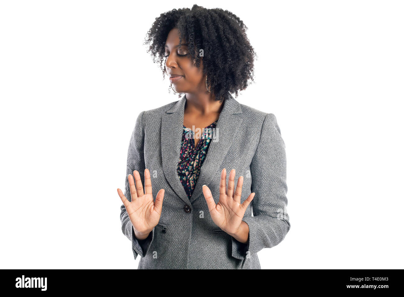 Black African American female businesswoman isolated on a white background looking disgusted and embarrassed Stock Photo