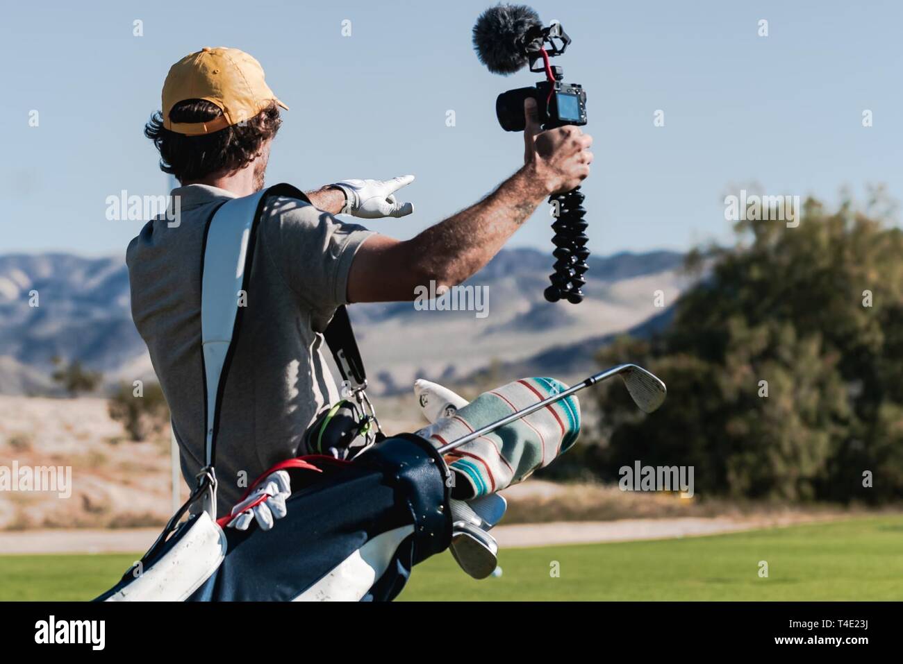 Erik Anders Lang, owner of Lang Creative, a production company, records a  vlog on The Desert Winds Golf Course, Marine Corps Air Ground Combat Center  (MCAGCC), Twentynine Palms, Calif., Mar. 25, 2019.