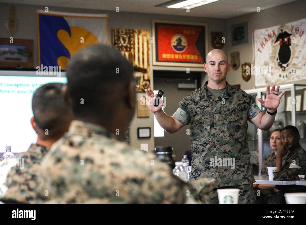 U.S. Marine Corps Sgt. Maj. Vernon Derby, the sergeant major of the Marine  Information Group, 1st Marine Division, speaks to staff noncommissioned  officers and commissioned officers during the Ethical Decision-Making  Leadership Instructor