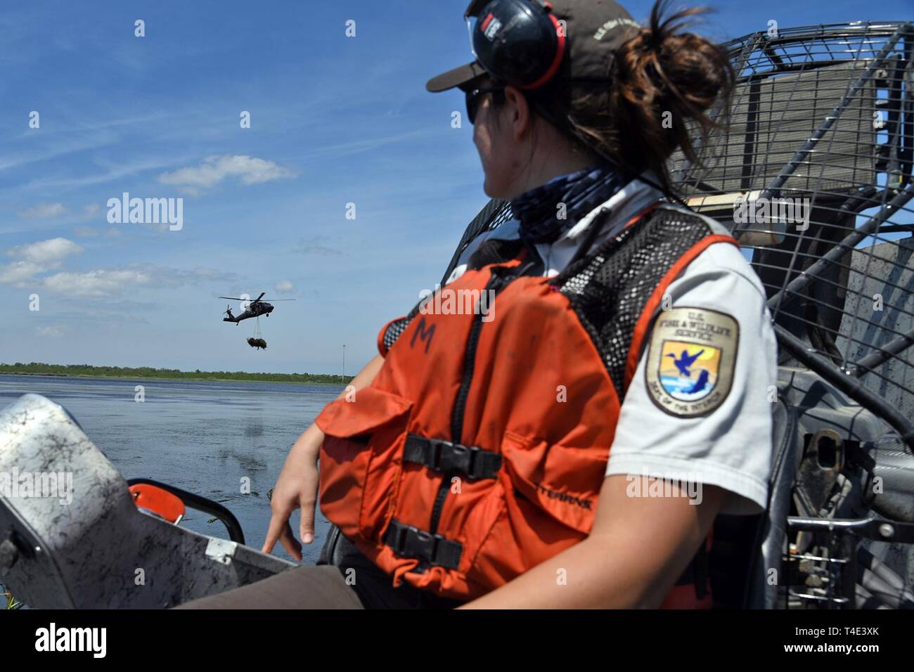 Christmas On The Bayou 2019 A member of the U.S. Fish and Wildlife Service waits for a Christmas On The Bayou 2019 A member of the U.S. Fish and Wildlife Service waits for a